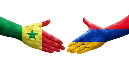 Handshake between Armenia and Senegal flags painted on hands, isolated transparent image.