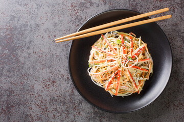 Kani or kanikama salad is a Japanese crab salad that is a delicious mix of crab meat crunchy...