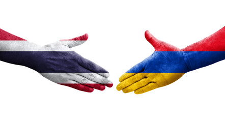 Handshake between Armenia and Thailand flags painted on hands, isolated transparent image.
