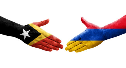 Handshake between Armenia and Timor Leste flags painted on hands, isolated transparent image.