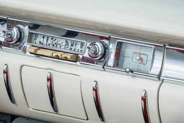 Car radio and clock in old classic Edsel car