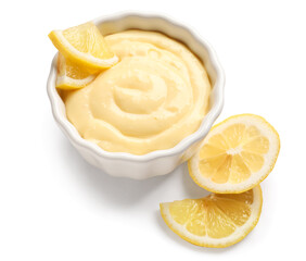 Ramekin of delicious vanilla pudding and lemon on white background