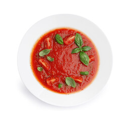 Plate of tasty tomato soup isolated on white background