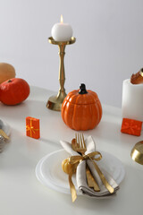 Concept of Thanksgiving day, Autumn table setting on white table