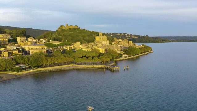Beautiful Establishing Aerial Shot of Trevignano Romano, Small Town and Commune with Orsinis Fortress in Background