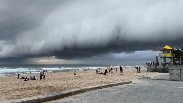 Crazy storm season approaching, the sky covered in dark stormy clouds at Surfers Paradise, Gold Coast, Queensland, Australia.