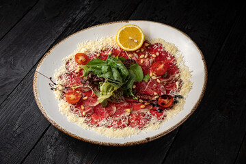 delicious veal carpaccio on a plate