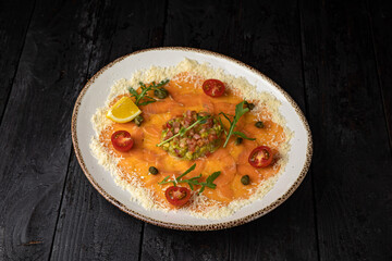 delicious salmon carpaccio on a plate