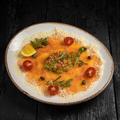 delicious salmon carpaccio on a plate