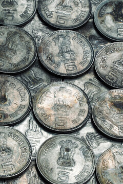 Indian old five rupees coins in full frame. Vintage coins. Old coins.