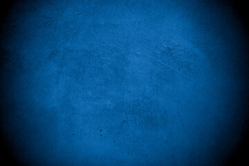 Old wall pattern texture cement blue dark abstract  blue color design are light with black gradient background.
