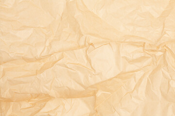 crumpled brown baking paper sheets