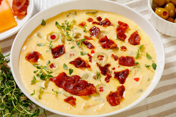 Beer cheese soup in bowl, top view