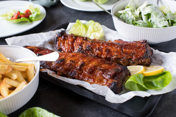 Barbecue spareribs on a dinner table