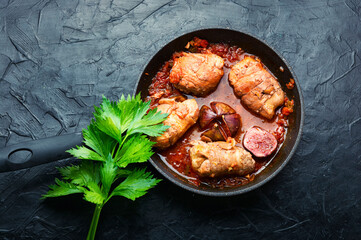 Appetizing meat fried with figs