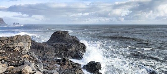 Sea waves and cliffs in Dyrholaey, Iceland