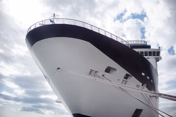 Rope moored ship . Cruise boat anchored in port 