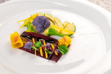 Dish with avicado, broccoli and herbs. Vegan cuisine. Detox menu