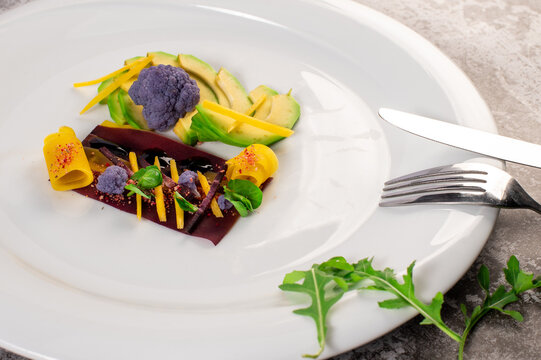 Dish with avicado, broccoli and herbs. Vegan cuisine. Detox menu
