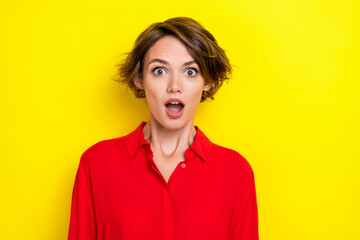 Photo of nice gorgeous pretty cute woman with bob hairdo wear red shirt impressed sale shopping isolated on yellow color background - Powered by Adobe