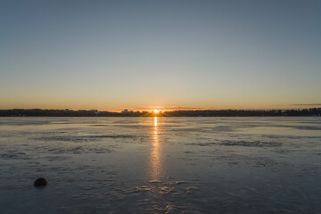 winter sunrise over frozen sea