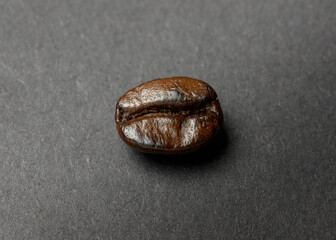 Coffee bean roasted on black background
