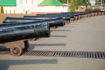 Guns and the Assumption Admiralty Church in Voronezh, Russia. Admiralteyskaya square