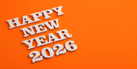 We wish a happy new year 2026 - White letters on wood