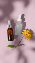 illustration of blank packgaing white and black glass dropper serum on a beige background with yellow flower. hard light. ready for design yours mockup