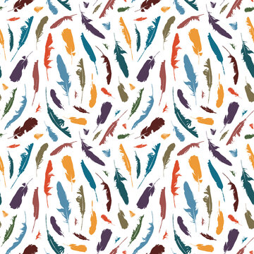 Seamless pattern with colored disheveled feathers on a light backdrop in boho style. Vector repeating background with randomly scattered bird feathers. Suitable for wallpaper, wrapping paper, fabric