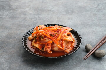 Kimchi or Kimci, a traditional Korean food, pickled fermented vegetables with a spicy seasoning
