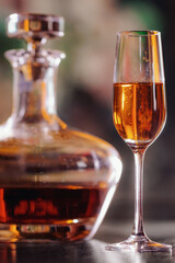 glass of expensive rum with its bottle