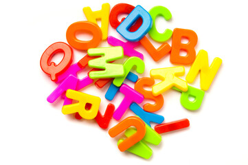 colorful plastic alphabet letters isolated