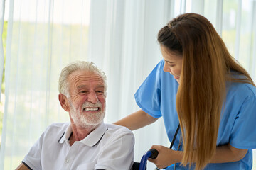 Happy scene for Home healthcare service , Grand Pa oldy man smile on wheelchair with smiling nurse in home