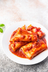 meat cannelloni pasta dish stuffed tomato sauce healthy meal food snack diet on the table copy space food background