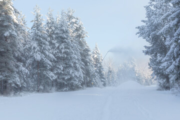 Artificial Snow Machine Making Snowflakes at Slope in Ski Resort Bansko, Bulgaria. Snowmaking Cannon
