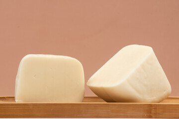 Minas half-cured cheese on a bamboo tray,