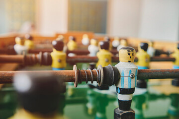 Sport team football players game. Table football for stand. Players miniatures dolls retro games....