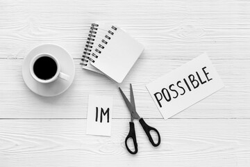 Personal development concept. Word Impossible becomes Possible
