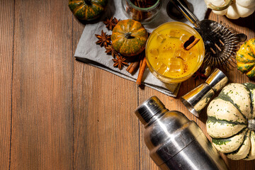 Homemade boozy pumpkin cinnamon cocktail, Refreshing iced pumpkin spice old fashioned cocktail,...