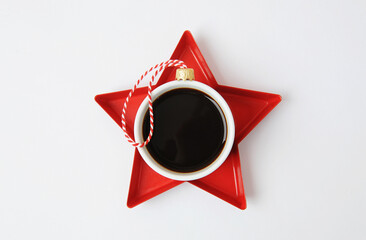 Christmas New Year coffee concept. Cup of black espresso coffee decorated as christmas tree ball on...