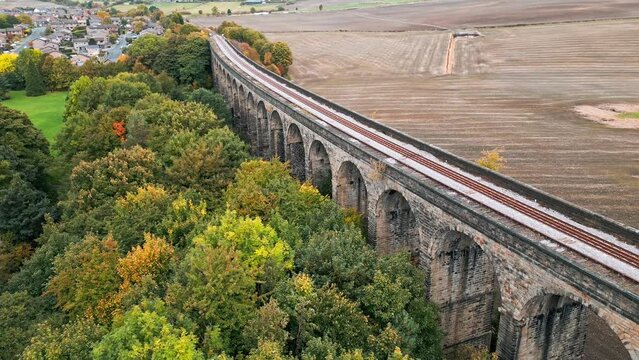 Drone footage of the Penistone Viaduct a curved railway viaduct which carries the Railway over Sheffield Road and the River Don.