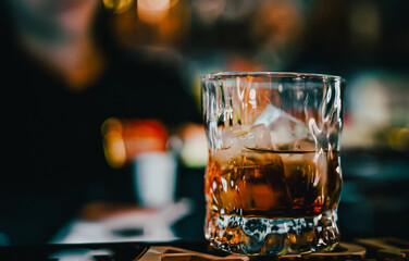 bartender making cocktail in bar