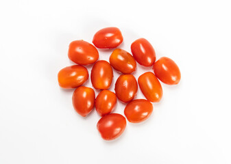 red cherry tomato stack isolated on white background.  small tomato support healthy vision and help protect against cancer. top view.