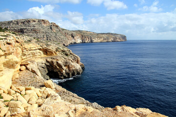 Fototapeta na wymiar Steep cliffs of Ras il-Bajjada near the Blue Cave on the island of Malta 