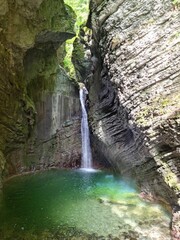 Vertical of the Kozjak waterfall at the end of a gorge in Ladra, Slovenia