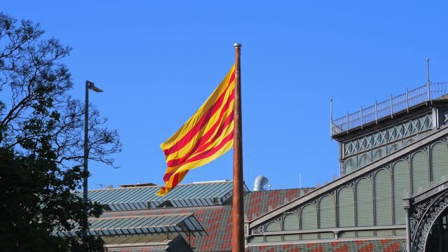 Huge Catalan Flag Flies In Front Of El Born Cultural Center In Barcelona, Spain.
