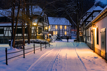 Historic village winter panorama in Iserlohn Sauerland Germany. Old houses with half timbered truss...