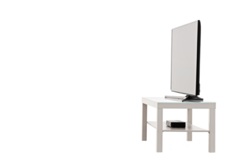 Side view shot of a flat screen TV on a white shelf