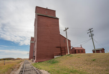 Old grain elevator on the prairie at the town of Rowley, Alberta